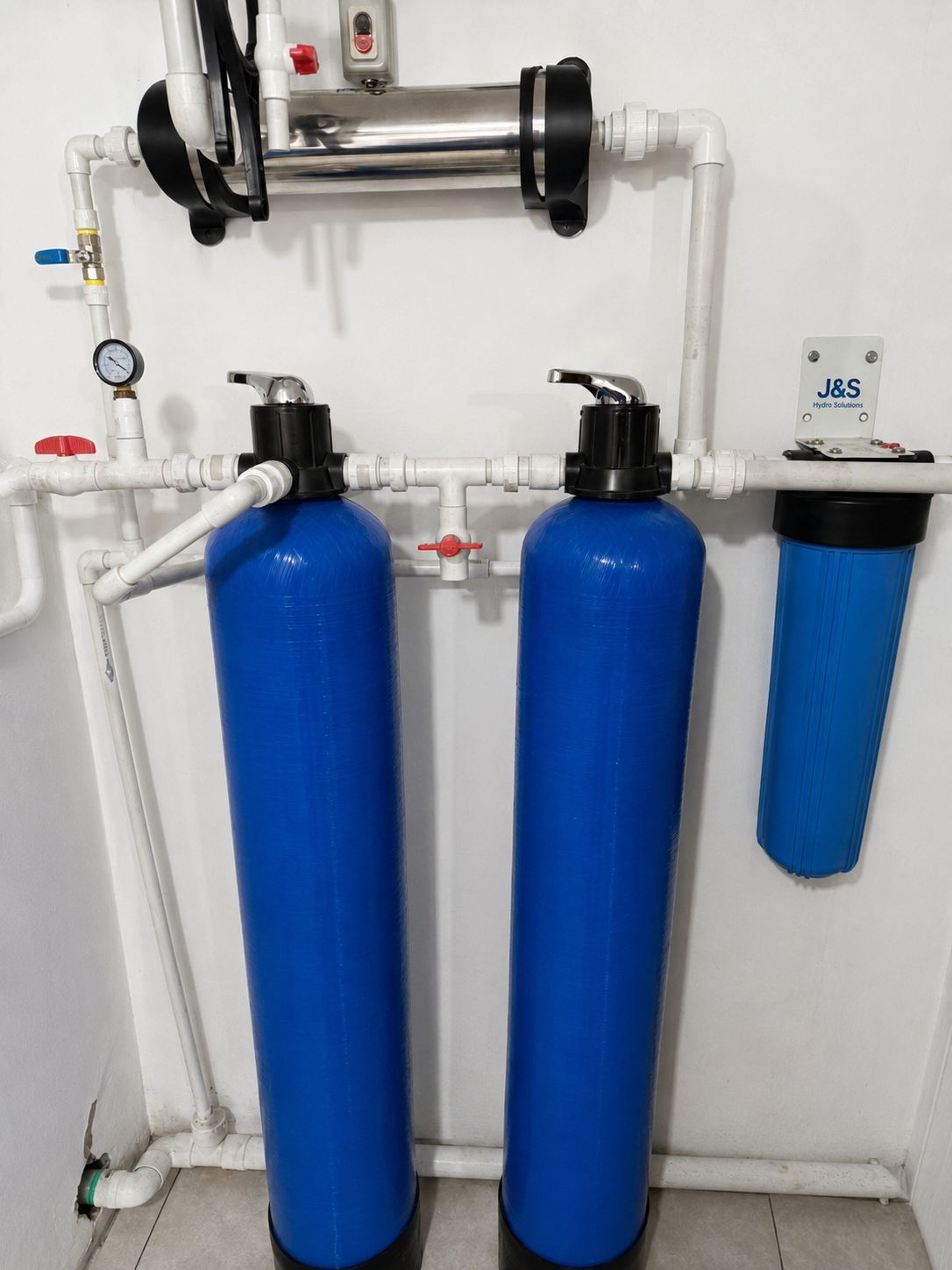 Doble portafiltro azul instalado en pared